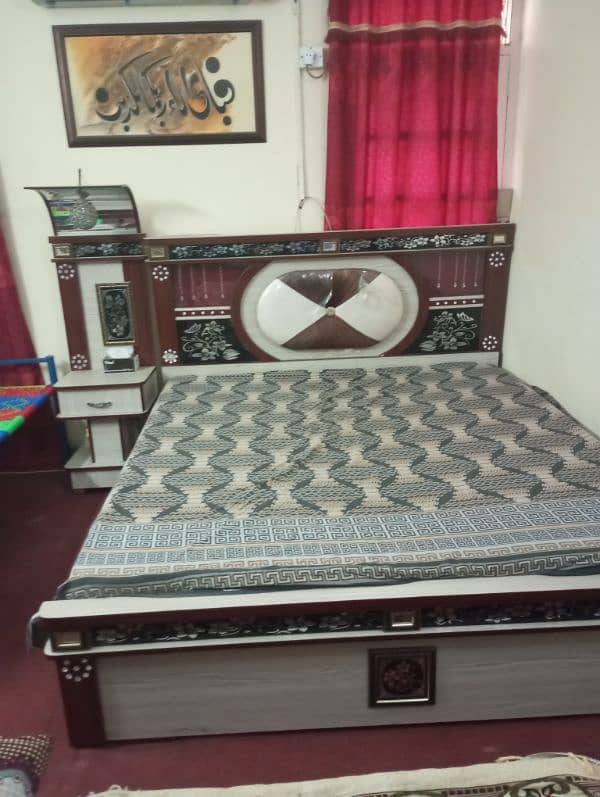 double bed with two side tables and dressing table 4