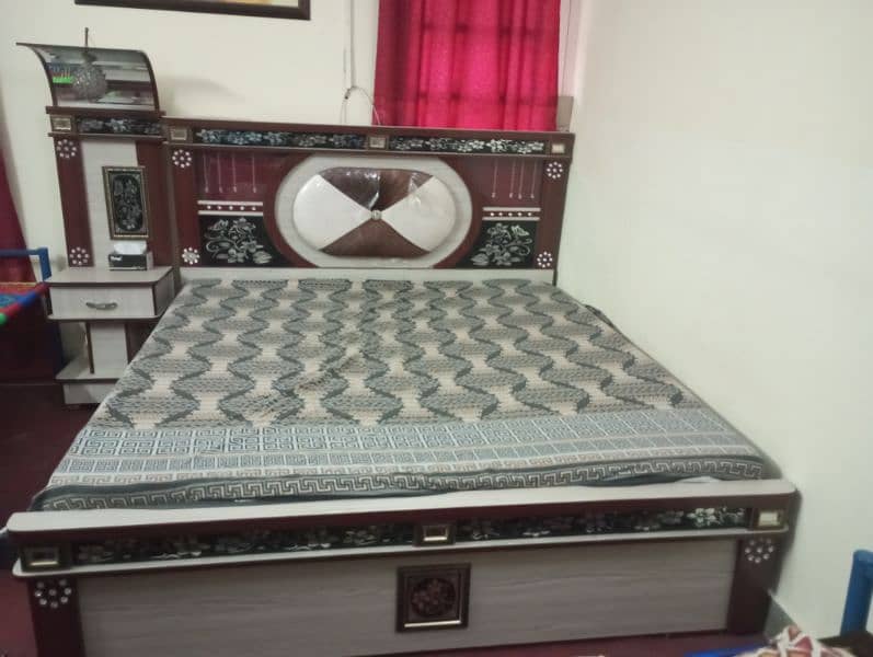 double bed with two side tables and dressing table 9