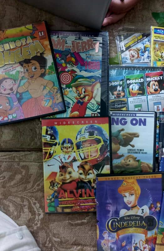 kids cartoon + latest movies DVDs available 2