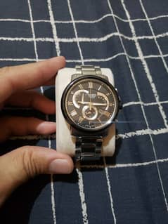 Casio watch with silver black dial