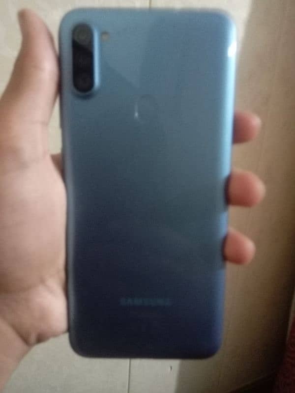 Samsung Galaxy A11 with charger and adapter contact for clear picture 0