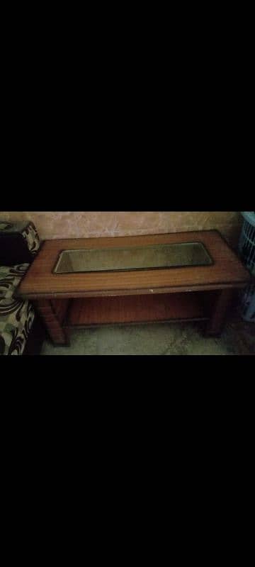 Wooden Table with Glass on front. 0