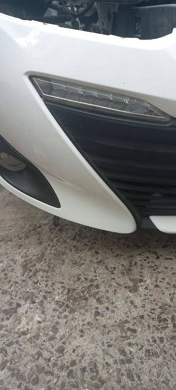 Day light toyota yaris bumper fitting 3