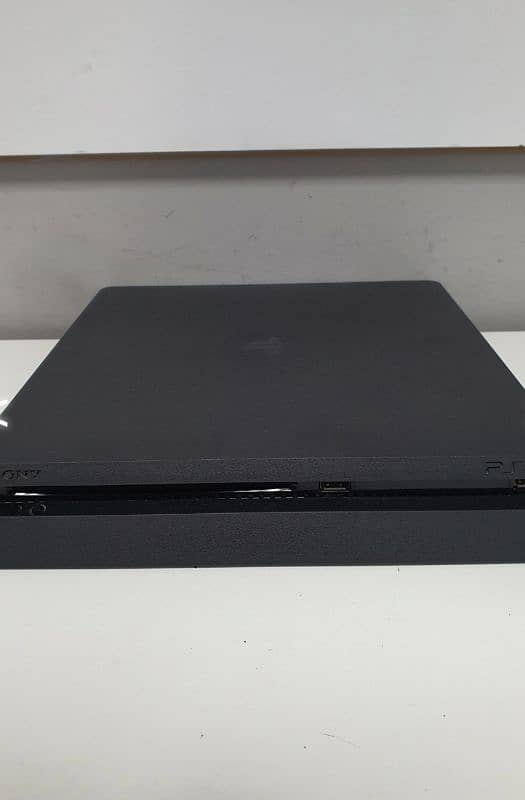 PS4 1 tb only 1 month used with 2 controller and taken 7 5