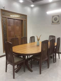 8 Chairs Wooden Dining Table in good condition