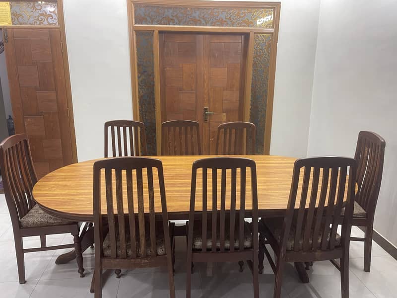 8 Chairs Wooden Dining Table in good condition 1