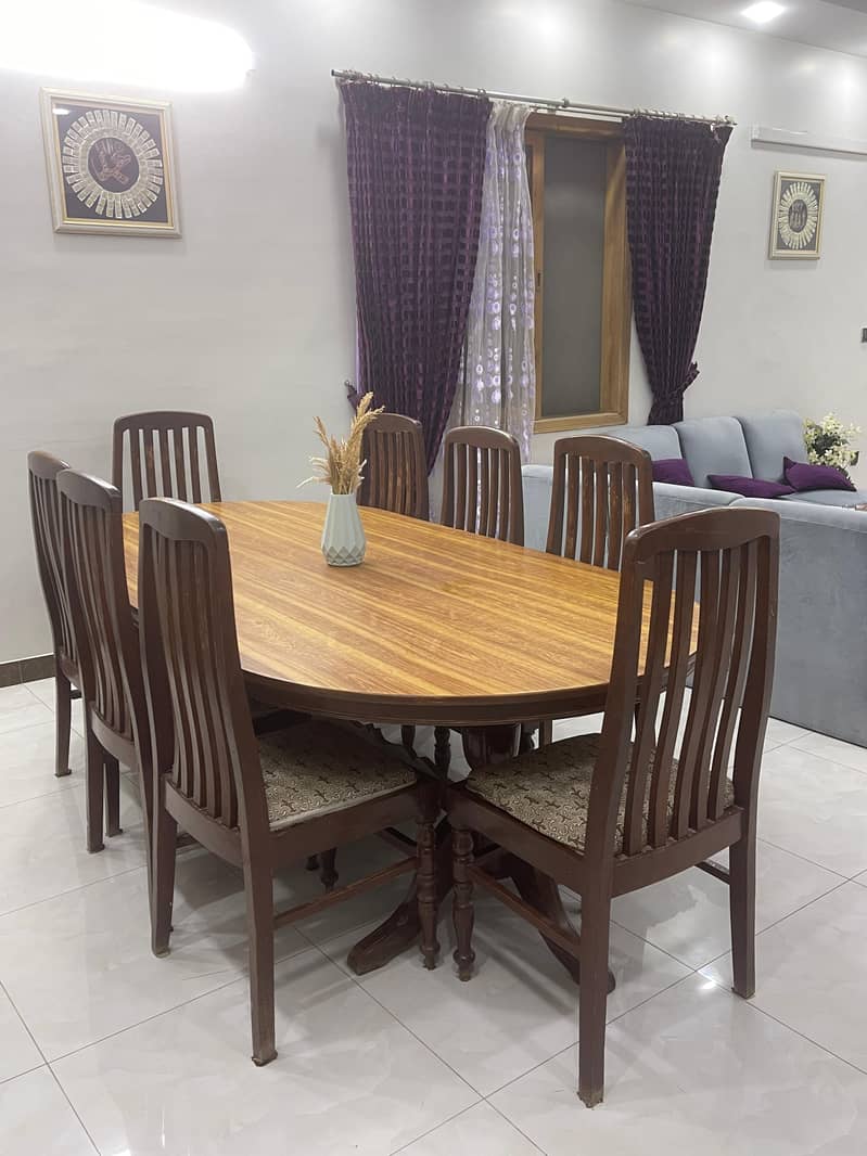 8 Chairs Wooden Dining Table in good condition 2