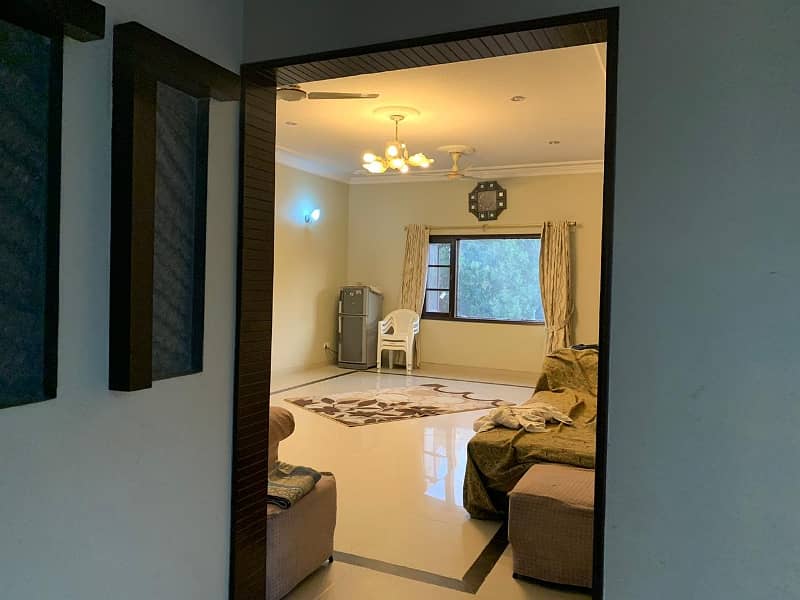 DHA | GIZRI LANE | 300 YARDS DUPLEX HOUSE FOR SALE | 4 BED DD | WELL MAINTAINED | WATER AVAILABLE | SOLAR GRID INSTALLED | GREEN LAWN | PEACEFUL VICINITY | 12