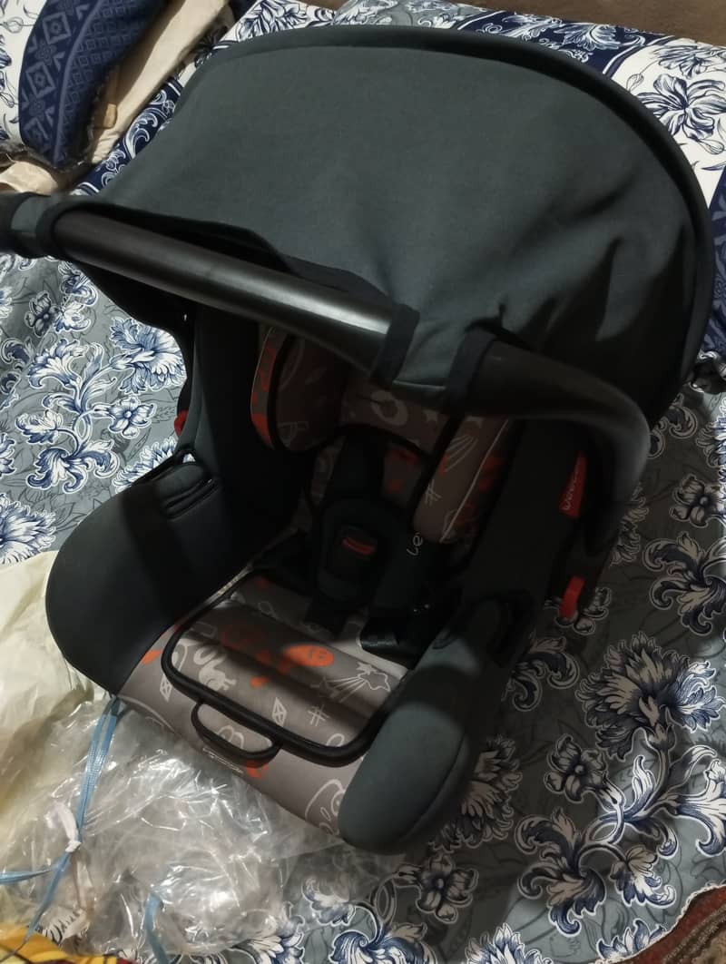 Wheeler new baby carry cot 1