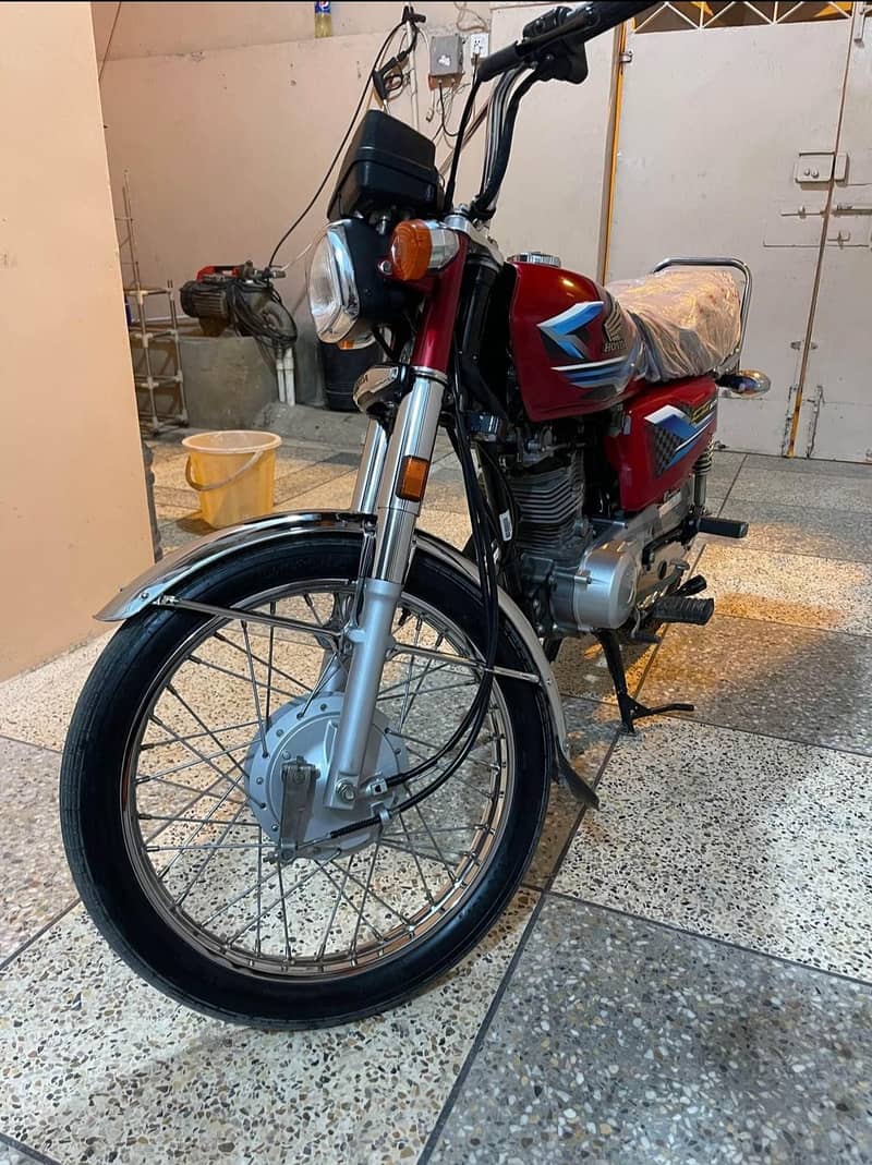 Honda cg 125 2024 zero meter condition first owner karachi number 1