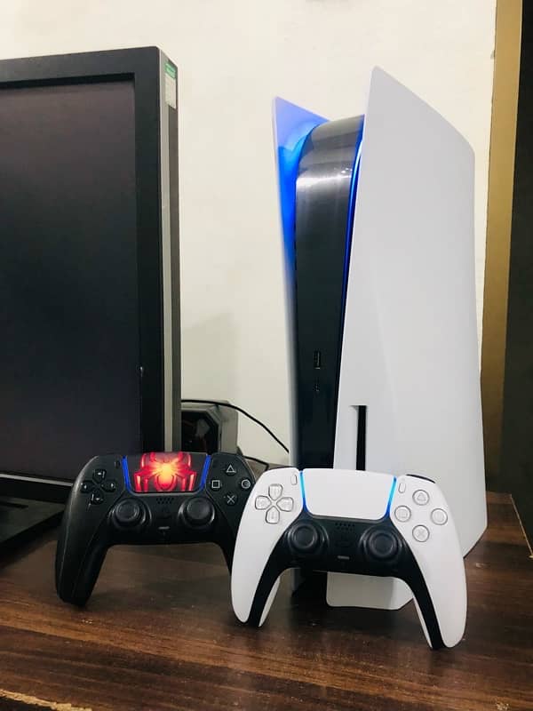 PS5 with two original controllers 0