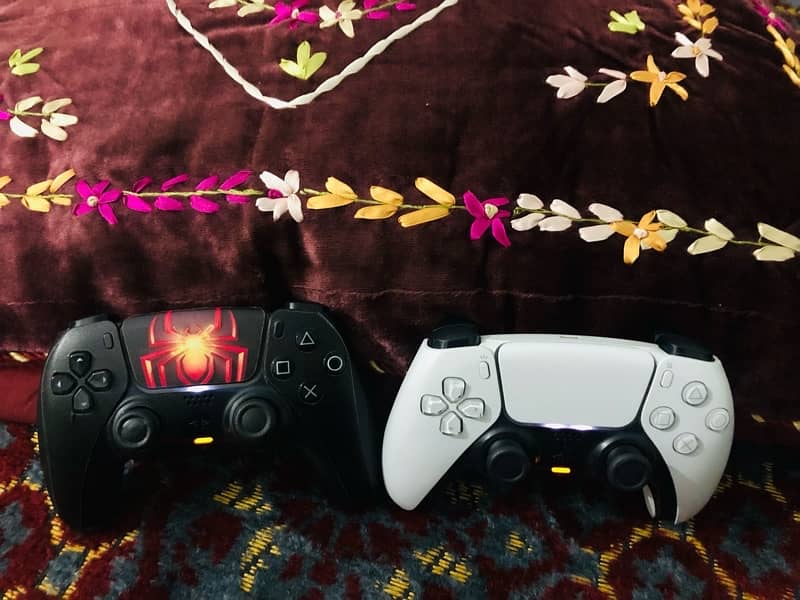 PS5 with two original controllers 16