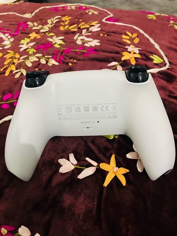 PS5 with two original controllers 19