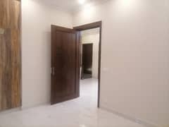 Affordable Prime Location Flat For rent In Grand Avenues Housing Scheme 0