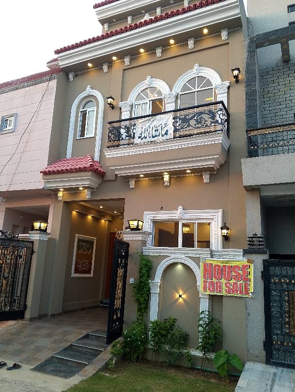 3 MARLA BRAND NEW LUXURY SPANISH ELEVATION DESIGN HOUSE AVAILABLE FOR SALE IN FORMANITES HOUSING SCHEME BLOCK -N LAHORE.   REGISTRY ANTAQAL.  DRIECT ACCESS FROM MAIN ROAD.  NEXT TO CORNER HOUSE. 3