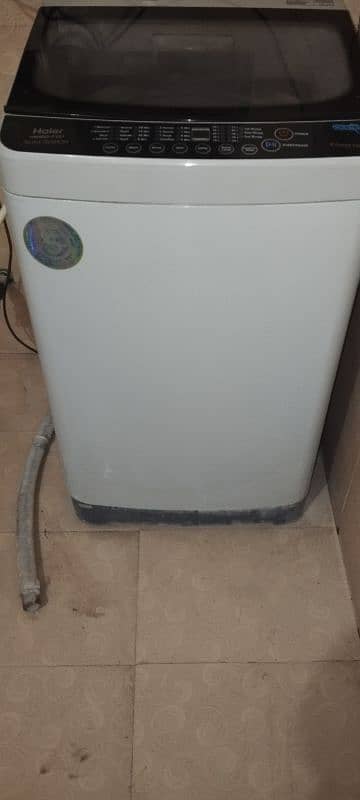 FULLY AUTOMATIC 8 KG HAIER WASHING MACHINE TOP LOADED 0