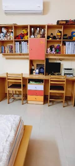 study table for two ,with book rack ,nd cabinets,moveable