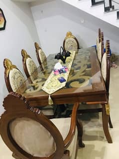 8 setter dining table with 2master chairs