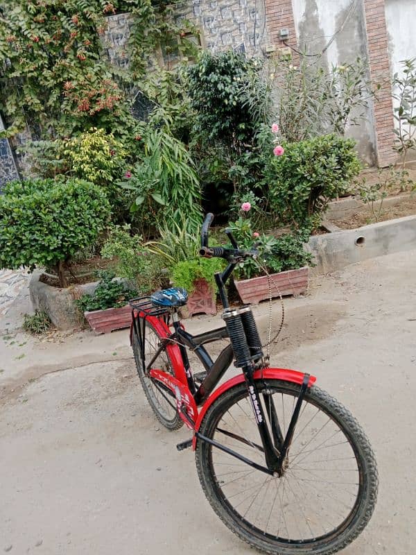 full jenvone steel . black and red paint . made in pakistan. some scratch 4