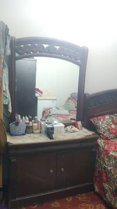 Bed and dressing table