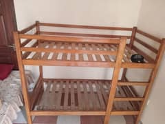 solid wooden bunk bed with out matress slightly used si