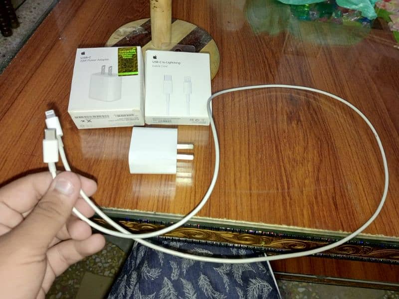 Iphone original cable and adapter with warranty slip. 1