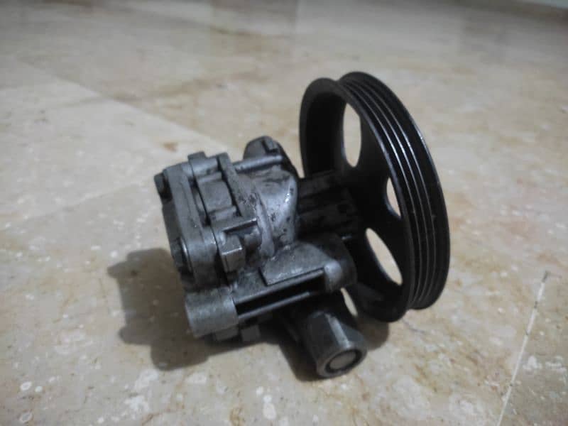 baleno steering power pump 0