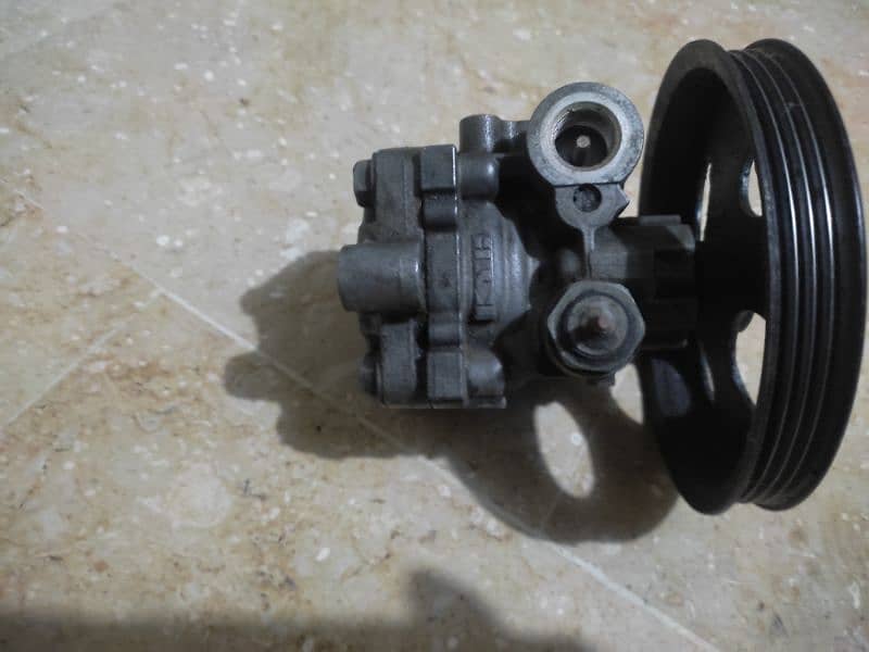 baleno steering power pump 1