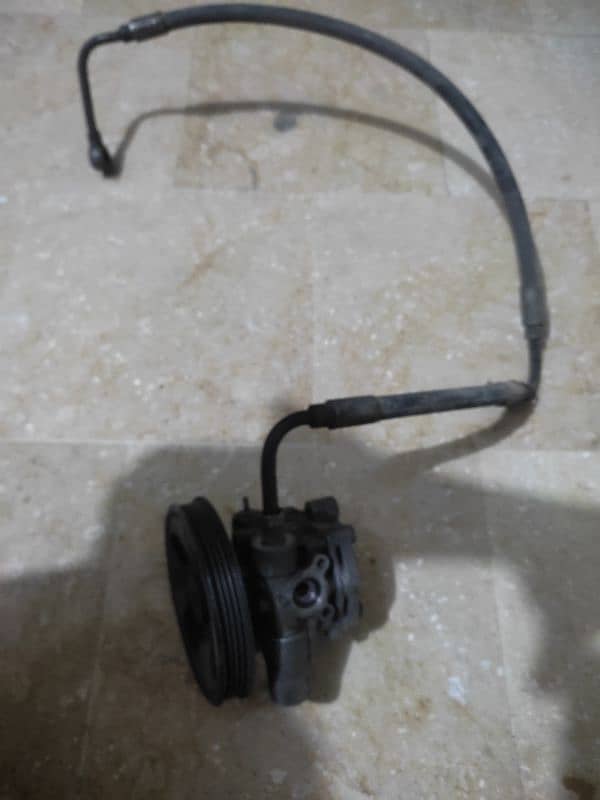 baleno steering power pump 2