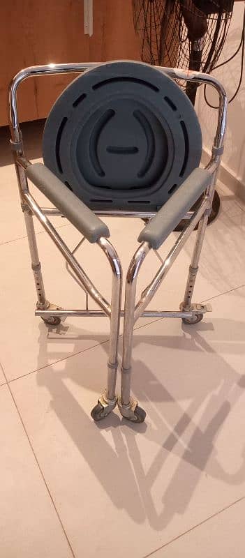 I am selling commode chair in very good condition 1