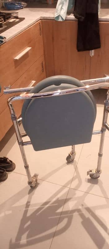 I am selling commode chair in very good condition 6