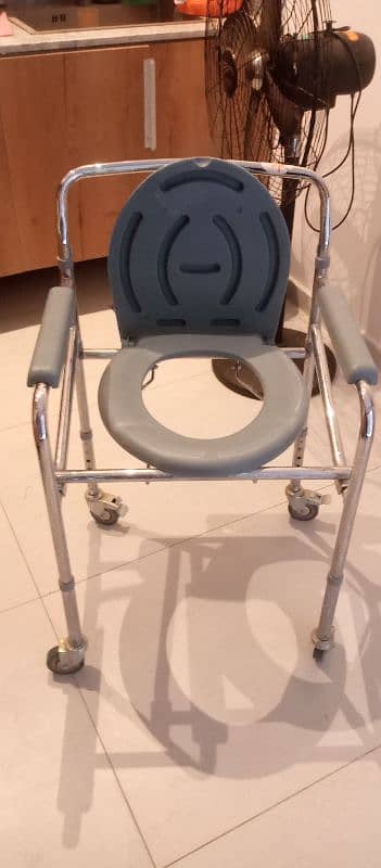 I am selling commode chair in very good condition 8