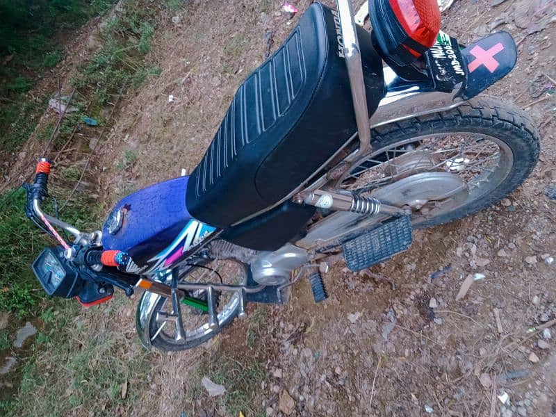 Honda 125۔۔۔ model 2003۔۔۔۔condition Good 8/10 4