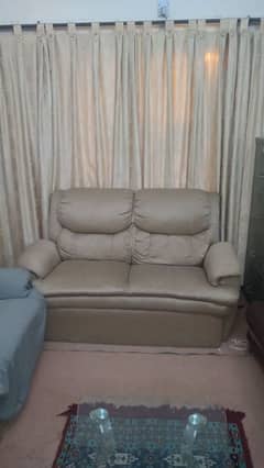 brown and beige color sofa sets