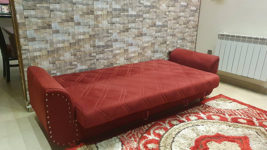 Red colour sofa-bed with master molty foam 0