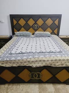 6 by 6 bed with side tables and  spring mattress