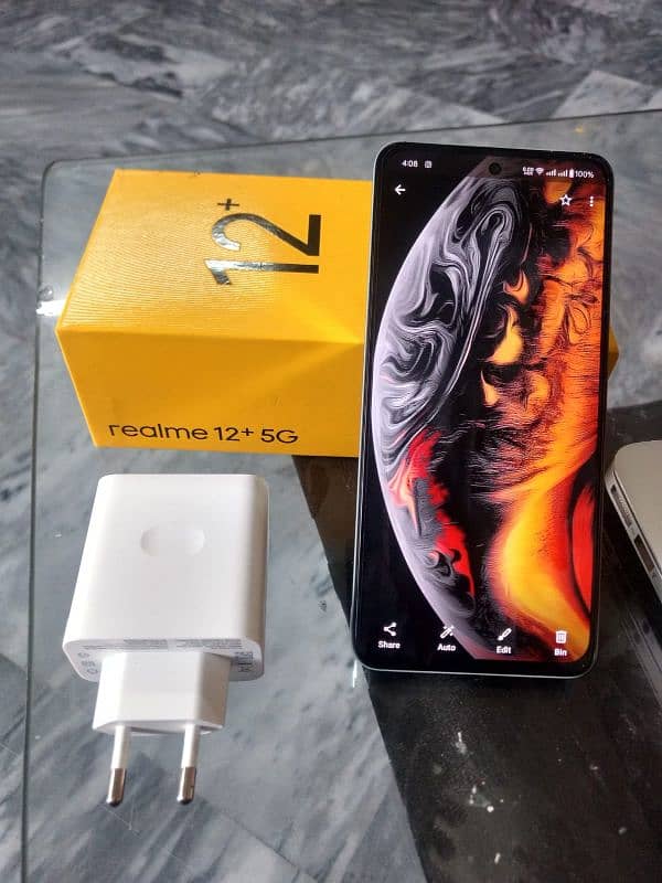 Realme 12 plus in warranty with complete box. 0