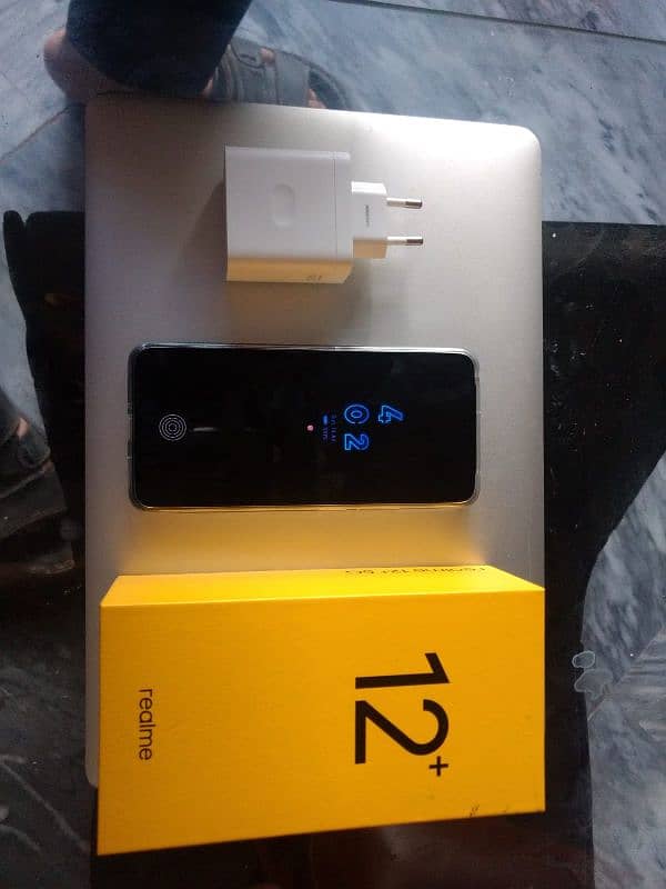 Realme 12 plus in warranty with complete box. 3