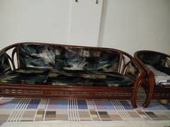 5 seater wooden sofa set with tables.