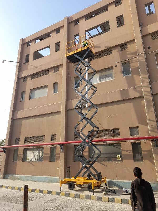 42 Feet Scissor Lift Available For Rent on Daily Basis in all Pakistan 1