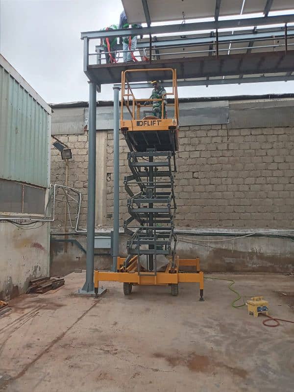 42 Feet Scissor Lift Available For Rent on Daily Basis in all Pakistan 5