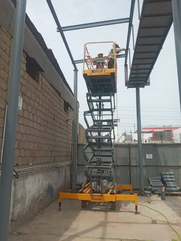 42 Feet Scissor Lift Available For Rent on Daily Basis in all Pakistan 6