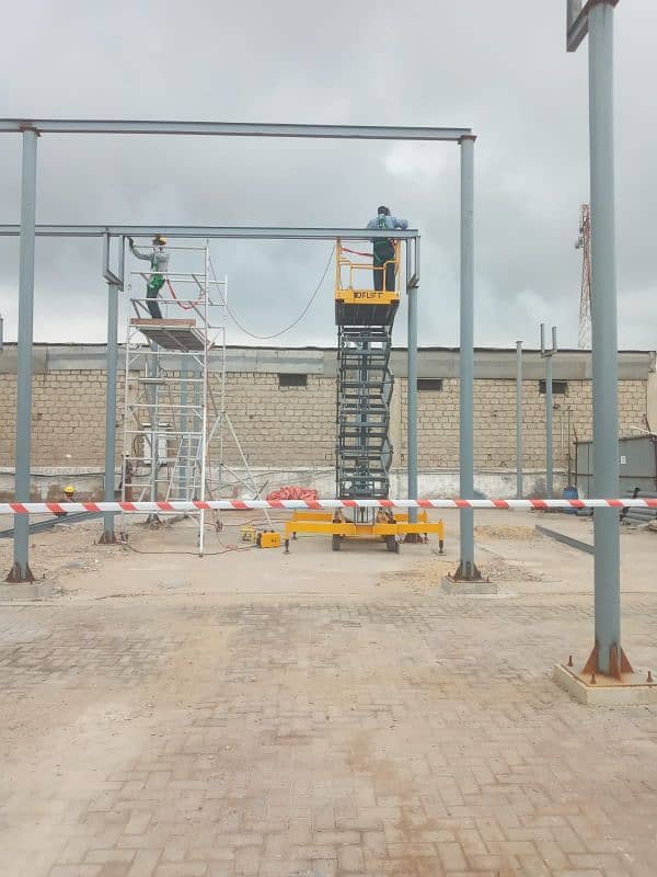 42 Feet Scissor Lift Available For Rent on Daily Basis in all Pakistan 7