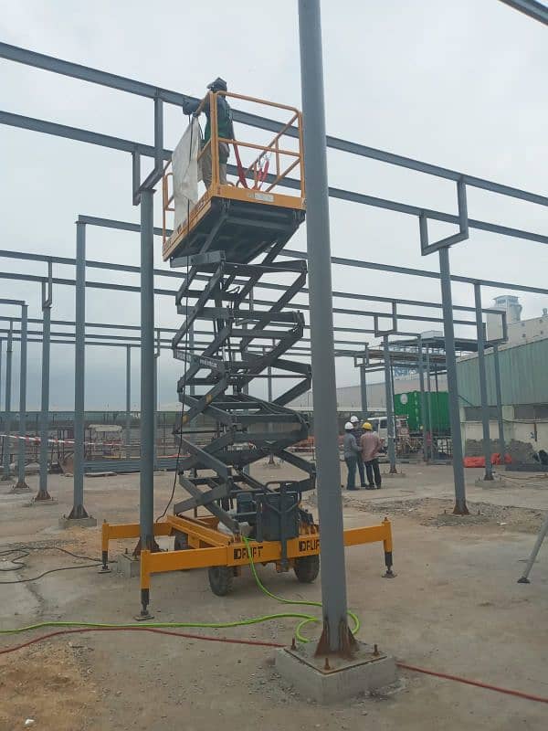 42 Feet Scissor Lift Available For Rent on Daily Basis in all Pakistan 8