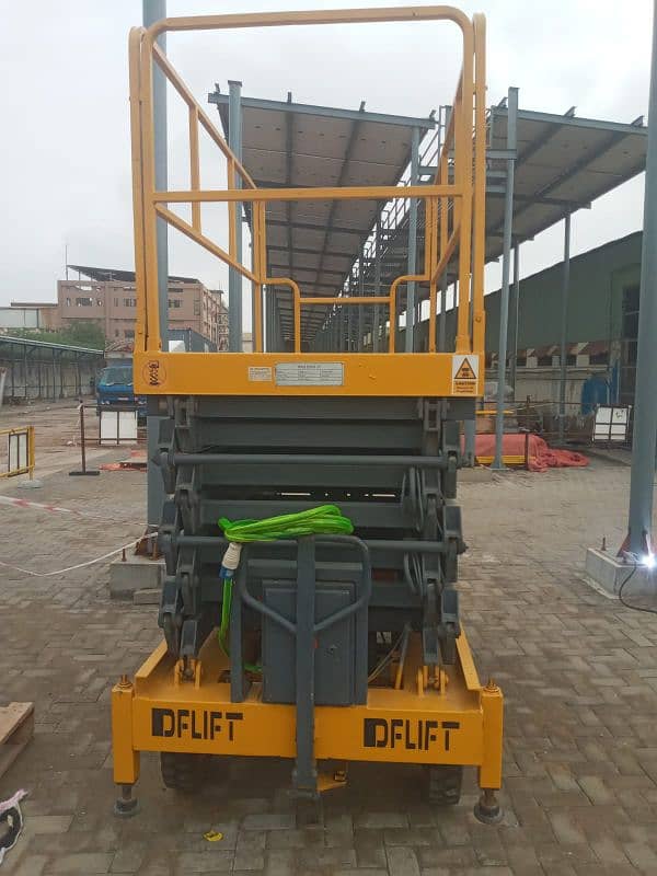 42 Feet Scissor Lift Available For Rent on Daily Basis in all Pakistan 10