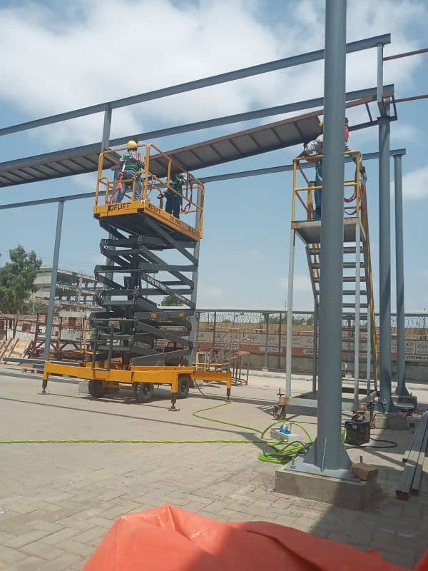 42 Feet Scissor Lift Available For Rent on Daily Basis in all Pakistan 16