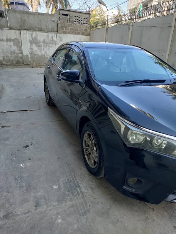 Toyota Corolla XLI 2014 cnvt gli reg 2015 3