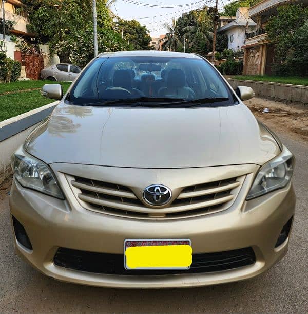 Toyota Corolla GLI 2011 original gold color 1