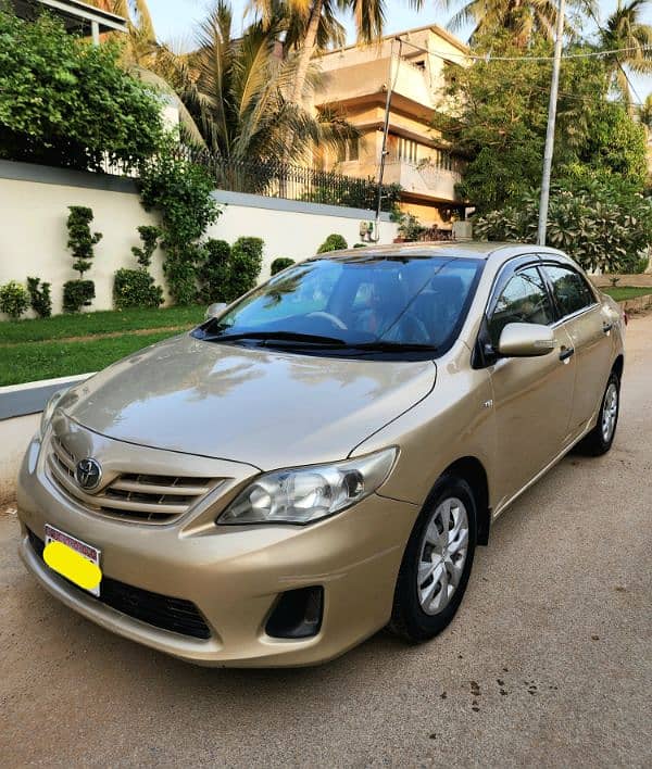 Toyota Corolla GLI 2011 original gold color 2