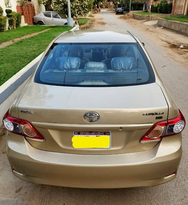 Toyota Corolla GLI 2011 original gold color 7